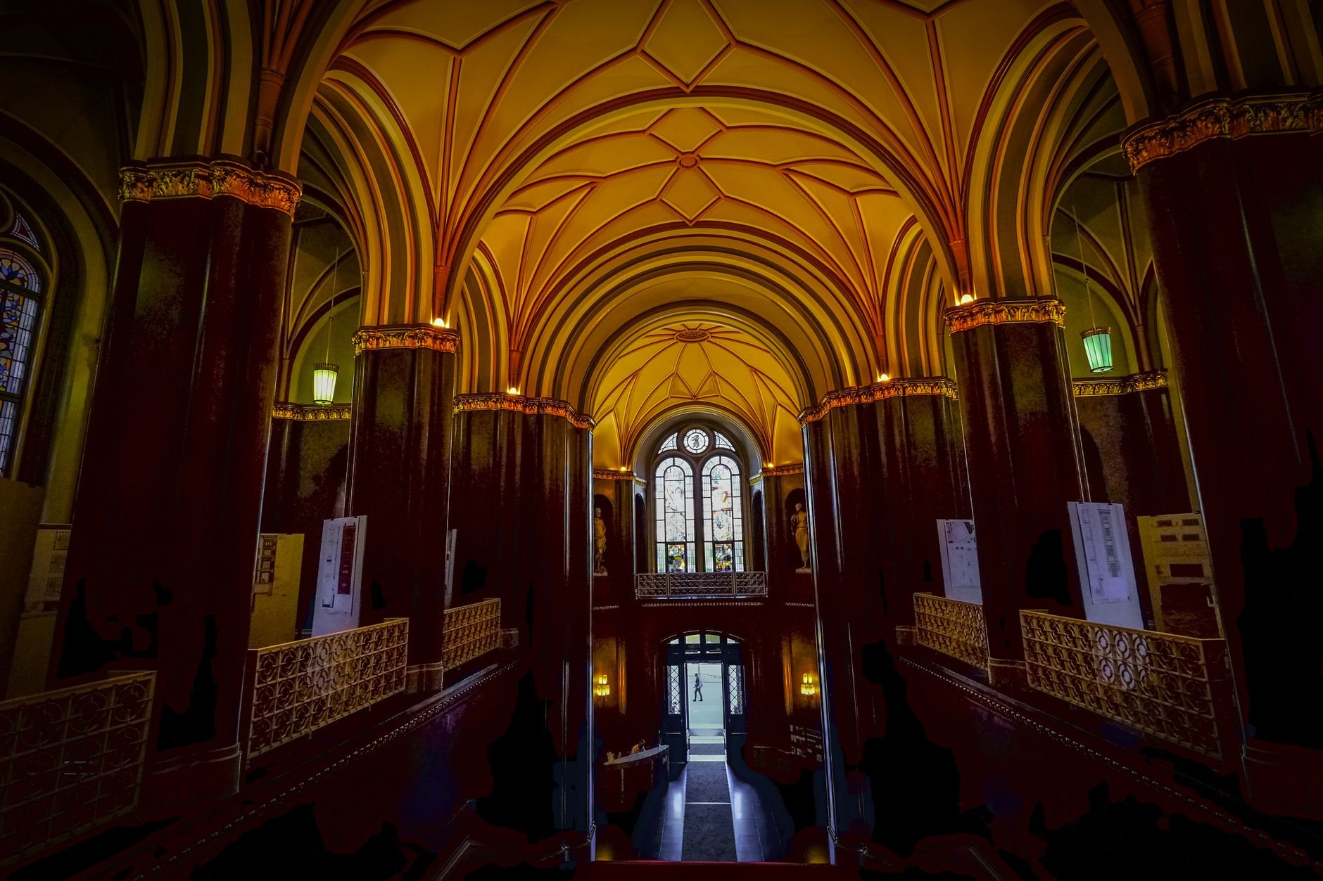 Grand vaulted architectural interior, deep and dramatic