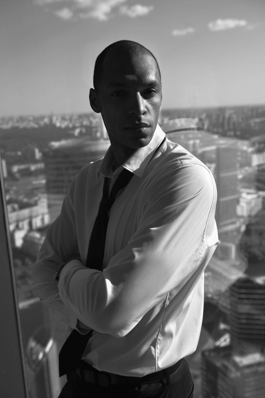 Black and white portrait of a confident businessman